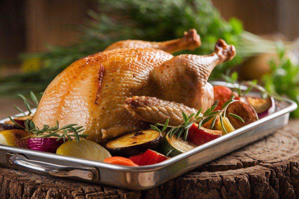 Sheet pan with browned ground turkey and roasted colorful vegetables